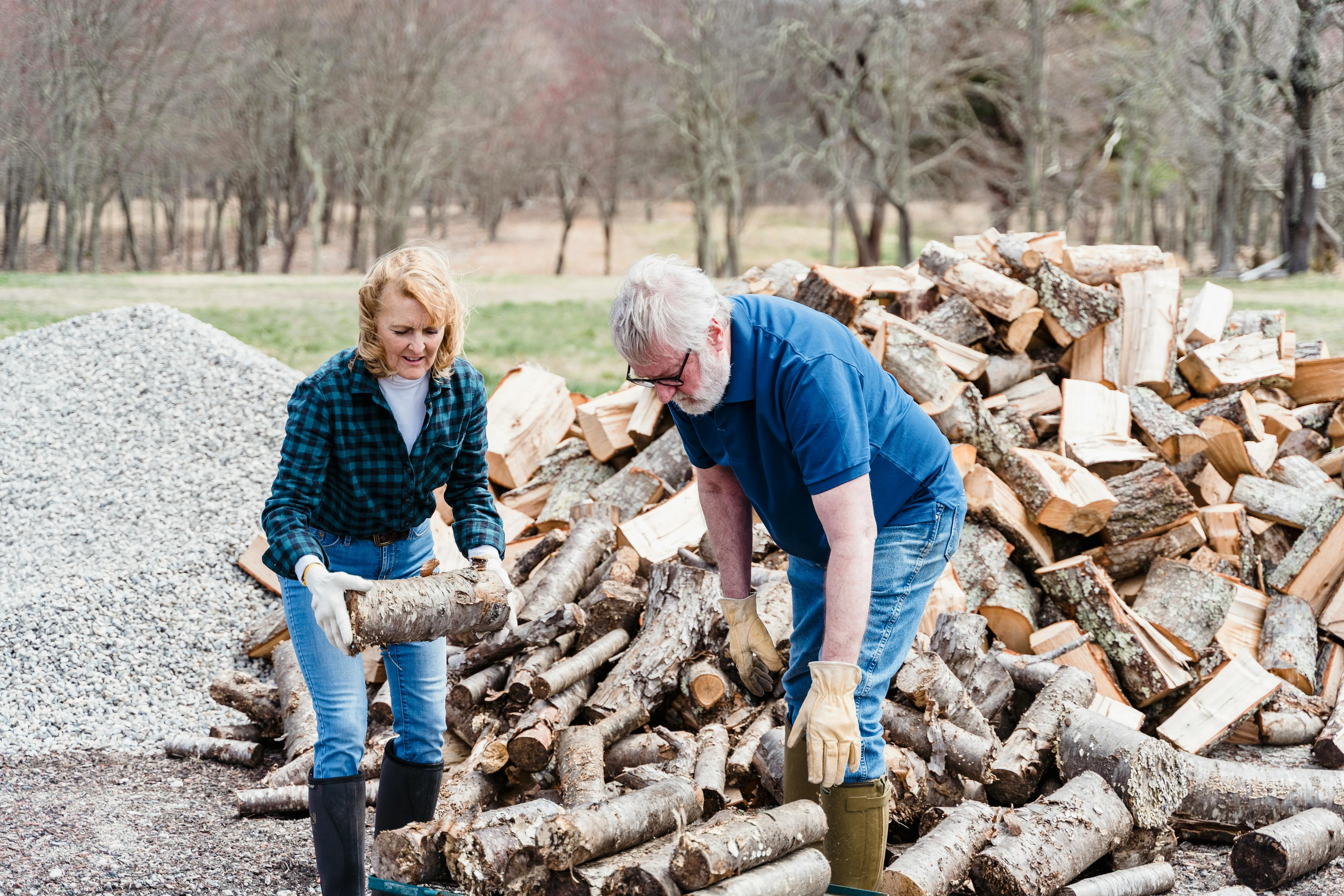 Man gardening with greenhouse